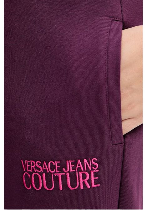 pantaloni tuta di cotone con logo VERSACE JEANS COUTURE | Pantaloni | 79HAAT06 CF01T317